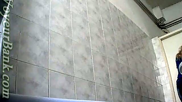 Chunky white milf in the toilet room pissing on hidden cam