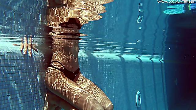 Underwater striptease by sex-appeal babe with plump ass Tiffany Tatum