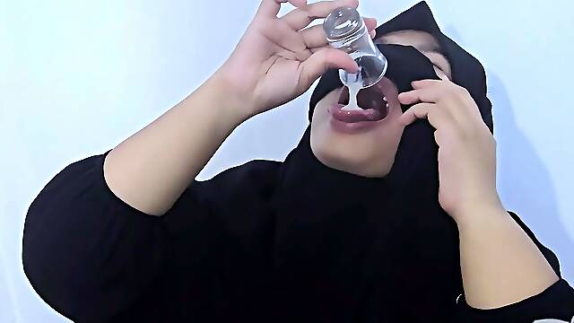 Malaysian in Hijab milks cock dry and swallows cumshot