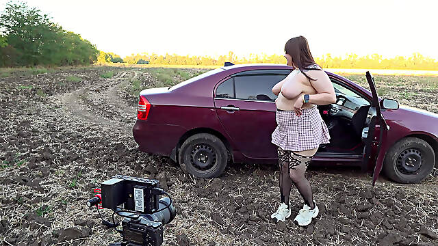 Hot sexy brunette with big tits masturbates in the car with vibrator