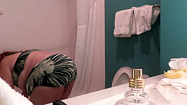 BBW nurse Vicki strips out of new 2 piece bikini set