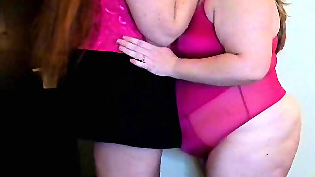 Tall Redhead and Short Blonde Getting Ready to Play