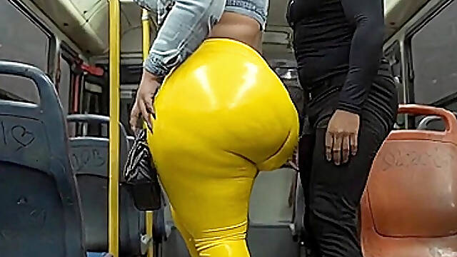 "Masked BBW Teases Huge Ass in Shiny Yellow Leggings on Public Bus"
