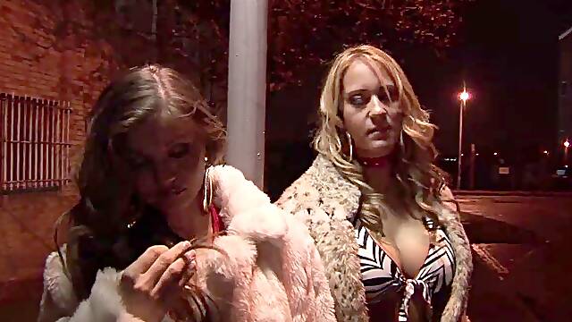 Blonde with smooth pussy joins milfs and girls in a steamy orgy with celebrities