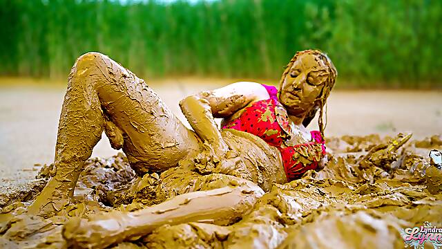 Orgasm in lake of mud