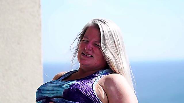 Semaj Media Thick GILF Heidi Nite Flashes on the Balcony